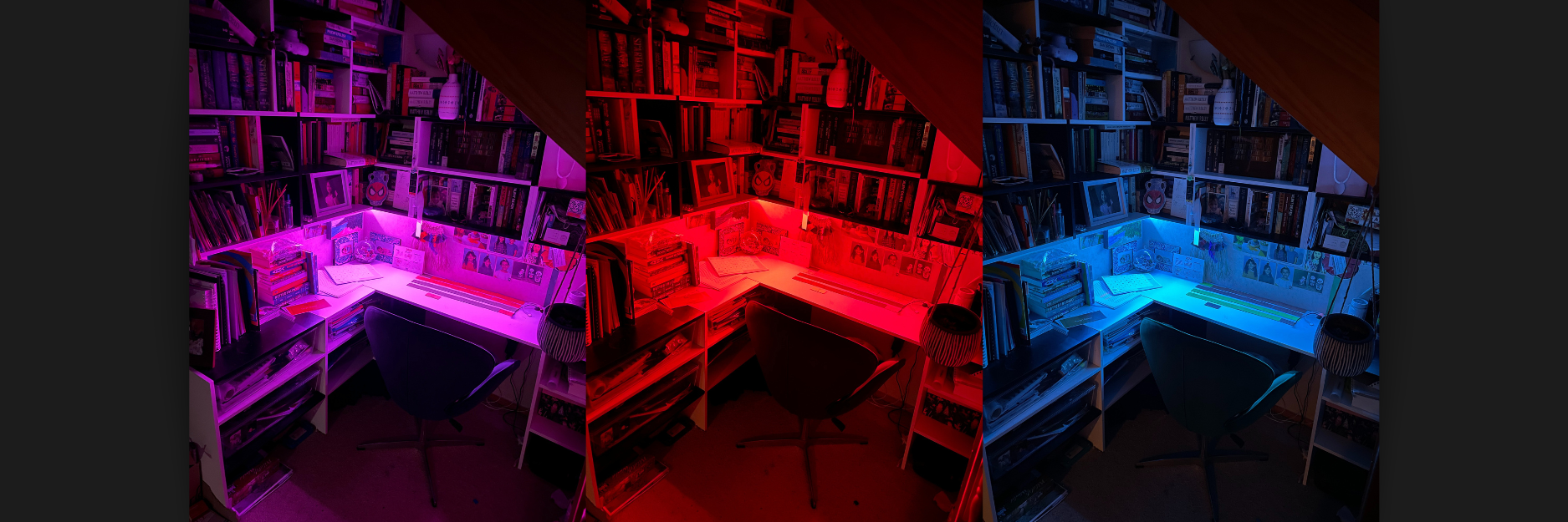 Taryn's writing space: a desk, stacks of books. Pictured in purple, red and blue.